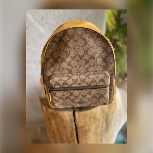Coach Handbags - MINI CHARLIE BACKPACK IN SIGNATURE CANVAS